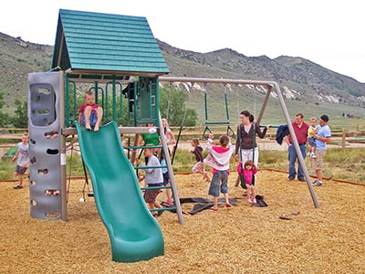 Many children enjoy the activities offered at the playground.
