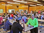 Guests eat a lunch surrounded by Western-themed decor.