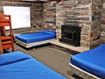 A view of one bedroom in the Red Creek Lodge, each bedroom is a unique style.