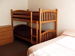 A view of one bedroom in the Tabby Mountain Lodge, all bedrooms are similar.