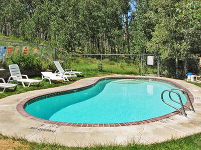 The Red Creek Lodge Pool is a kidney-shaped pool.
