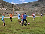 Youth enjoy the competition of a soccer game.